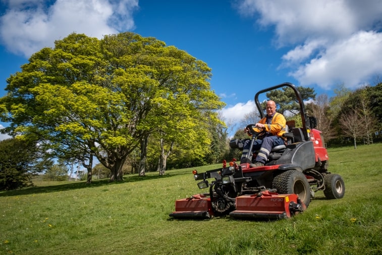 Dover District Council's Toro mower cutting a field.
